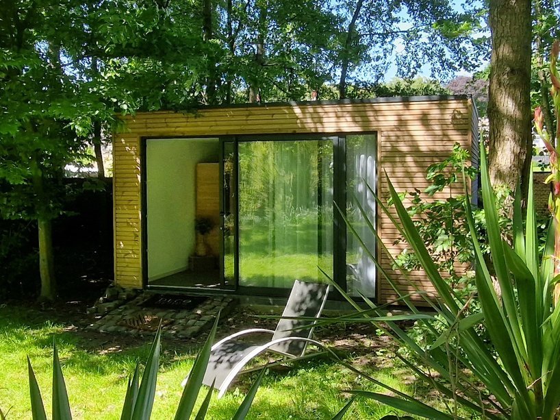 Exemple de construction en ossature bois d'un bureau de jardin.
